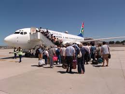 Passengers boarding a South African Airways B737-800 in Entebbe
