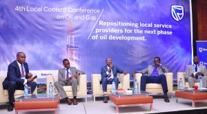 Edwin Mucai Stanbic Bank Head of Corporate and Business Banking (1st left)  moderates a panel discussion at  the 4th Oil & Gas Local content sponsored by the Bank. Panelists were the Guest Speaker Tonye Tamuno (centre) President/CEO of Primetek Nigeria, the Public Affairs coordinator / National content Leader Total E&P Uganda Tony Otoa (2nd left), the Vice Chairman of AUGOS Dennis Kamurasi ( 2nd right) and Executive Director Uganda Petroleum Authority Ernest Rubondo (right). The conference organized under the theme “Repositioning local service providers for the next phase of oil developments” was held to discuss the current and future opportunities for local content providers and the standards required of them to participate in Uganda’s Oil and Gas sector.   